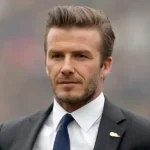 David Beckham at a public event showcasing his successful football and business career.