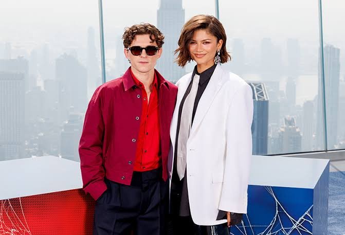 Zendaya and Tom Holland attending a red carpet event together.